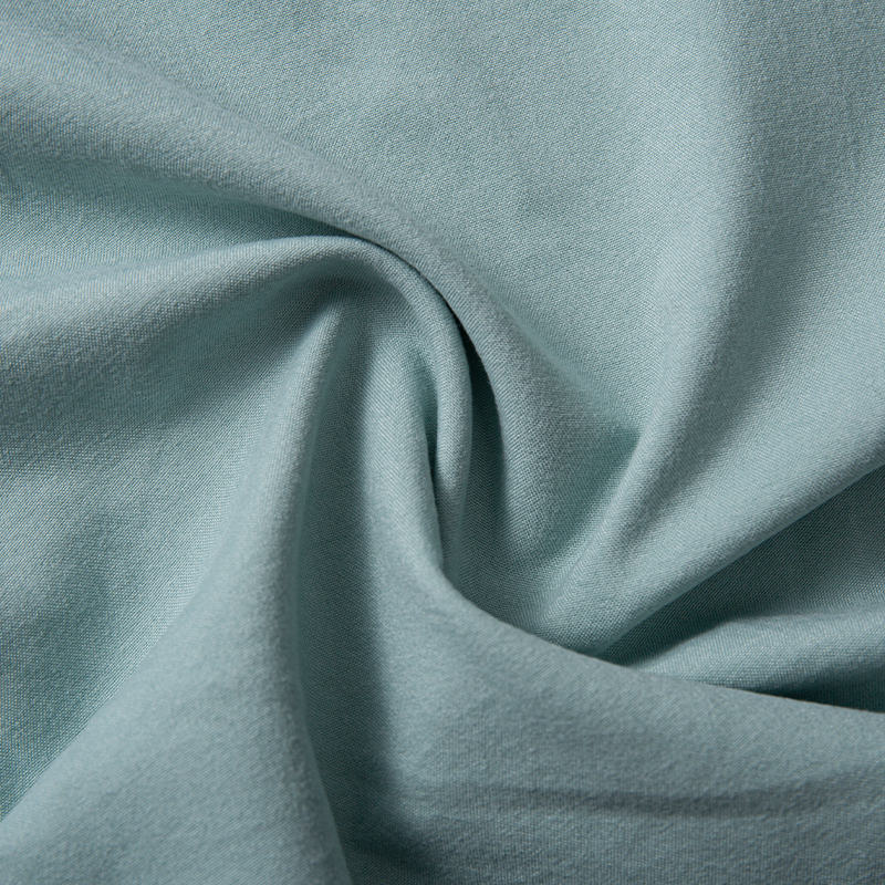 Tissu teint en polyester uni vert clair